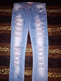 джинсы на девушку с вышивкой Костанай